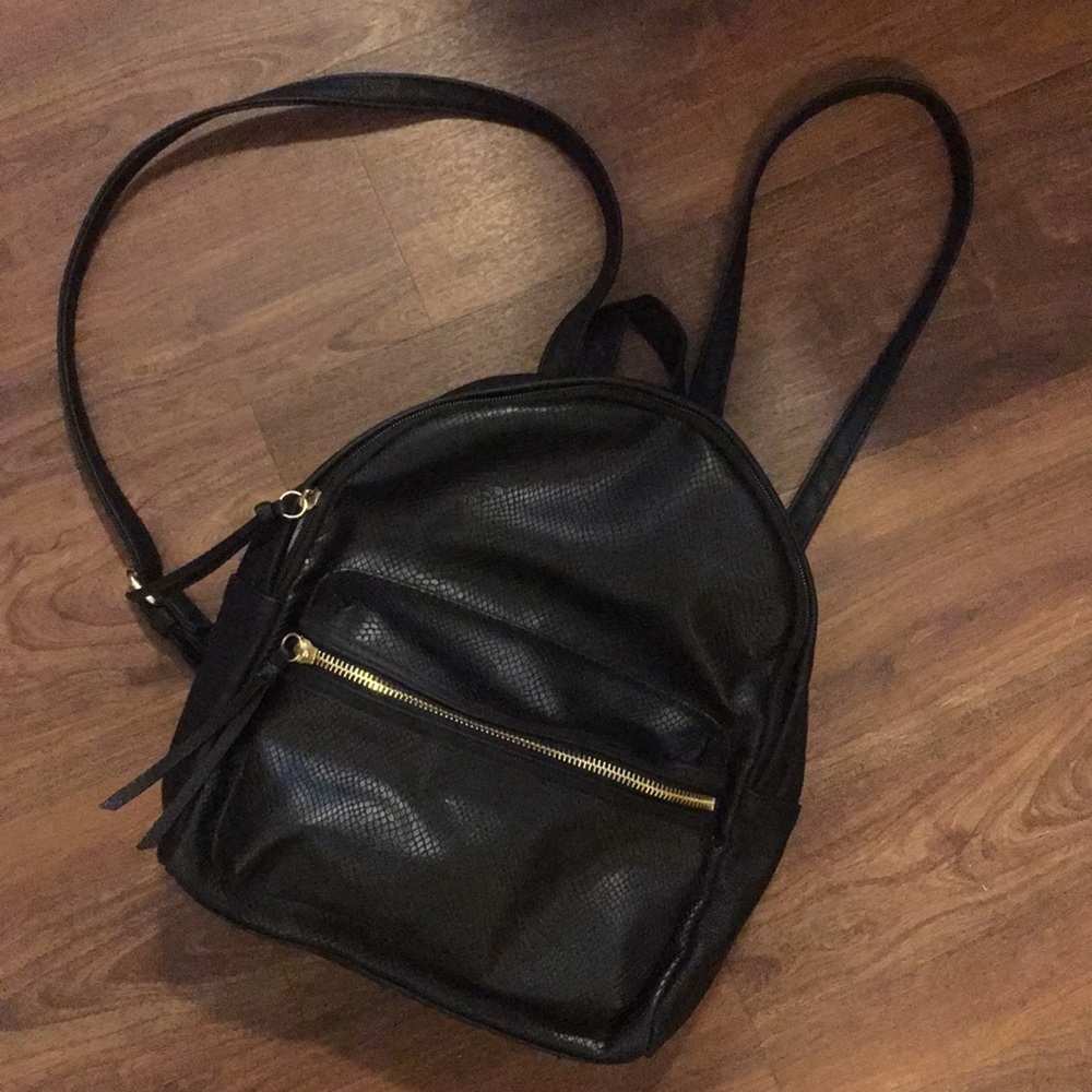 Semi structured black mini backpack